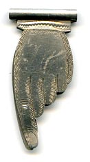 This bookmark was made in Birmingham England by Crisford and Norris. It is in the shape of a hand with the pointer finger pointing down. This is the smallest bookmark in the collection.
