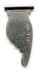 This bookmark was made in Birmingham England by Crisford and Norris. It is in the shape of a hand with the pointer finger pointing down. This is the smallest bookmark in the collection.