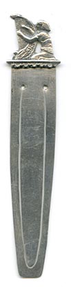 This bookmark was made in the US by an unknown manufacturer. It is marked sterling on the back. The top is an Egyptian themed scene of a man playing a harp. 