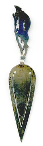 This bookmark was made in Canada or the US by an unknown manufacturer. It is in the shape of a trowel with the handle in the shape of a beaver on a tree branch. The middle blade says Montreal. It is marked sterling on the back.