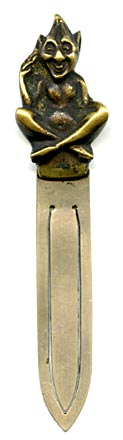This bookmark was made in Europe by an unknown manufacturer. The top is a high relief solid brass Imp, possibly the Lincolnshire Imp, and the blades are a white metal. The Imp is sitting cross legged with a big grin.