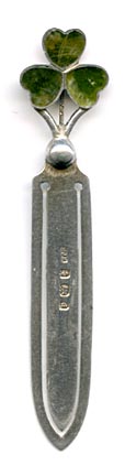 This bookmarks was made in England by William J. Holmes in 1903. The top is a three leaf clover in connemara marble.