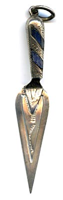 This bookmark was made (most probably in England). It is marked WH.I and Sterling Silver. It is in the shape of a trowel with blue agate pieces in the handle.