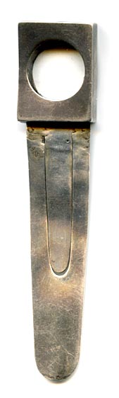 This bookmark is made in London, England. The manufacturer's mark is S.M. & Co. for Sampson Mordan & Co. The top is a magnifying glass and has a place for a tiny book (which unfortunately is missing). The date is 1894.