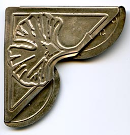 This bookmark was made in the US by Gorham. It is marked Sterling Gorham. The shape is a corner and has the picture of either a leaf or a tree. It was a promotional bookmark made for George Watts & Sons.