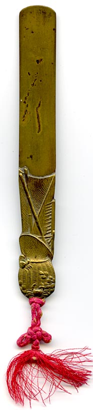 This bookmark is made in Japan between 1890 - 1910. The top has a basket with a crab climbing up and a red silk string.