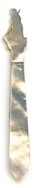 This bookmark was probably produced in France. It is made of mother-of-pearl and has a hand carved figural female maid holding a broom . The date is 1880 - 1900.