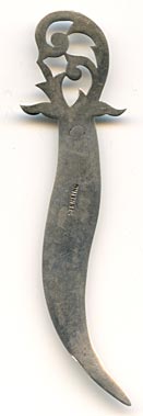 This bookmark was made in the US by an unknown manufacturer. It is hallmarked sterling on the back. It has a very small top blade and a curvy larger one. The top has a cutout flower.