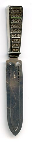 This bookmark was made in England by Payton, Pepper & Co., Birmingham with the hallmark of PP&Co. The date and city marks have been rubbed out. It is in the shape of a knife with an intricately designed handle.