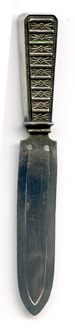This bookmark was made in England by Payton, Pepper & Co., Birmingham with the hallmark of PP&Co. The date and city marks have been rubbed out. It is in the shape of a knife with an intricately designed handle.