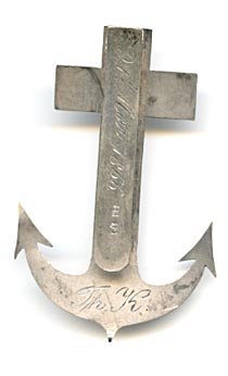This bookmark was made in a European country. It has two hallmarks but one is indecipherable. The other, 84 is possibly Russian but the inscription, 21s Mai, 1866 is French. The bookmark is in the shape of an anchor.