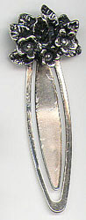 This bookmark is American made by an unknown manufacturer. It is a high relief of flowers and leaves. Marked only with 925 on the back, the date of manufacture is probably the 1990's.