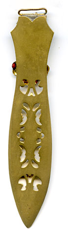 This bookmark was made in France. It is gold dorè and has an enamel flower and leaves which serves as the upper blade with a cutout longer blade.