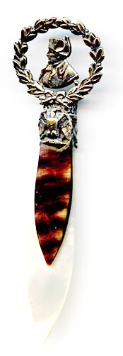 This bookmark was made in France as a souvenir of the Musee de L'Armee. It is silver plated brass, abalone and mother-of-pearl. The top has a bust of Napoleon surrounded by a wreath. Underneath there is an eagle. The Musee de L'Armee, located at the Invalides in Paris, France was originally built as a hotel for disabled soldiers (Invalides) by Louis XIV and now houses the Tomb of Napoleon 1st and the museum of the Army of France.
