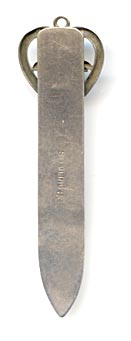 This bookmark was made in the US. It is marked sterling and has an unknown makers mark of either a reversed B and R or a three leaf clover. The top is a heart with an angel head in the center. 