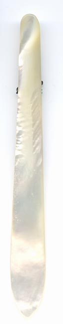 This bookmark was made in France. The top has a relief of Joan D'Arc in silver of her on her knees with her sword. It is mother of pearl and has the name Lusceuil on the top blade.