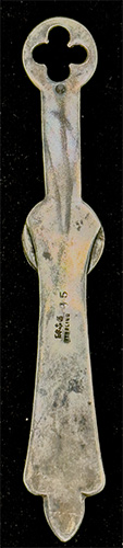 This bookmark was made in the US by Gorham Mfg. Company. It is marked with the manufacturers mark, sterling 36 and a star (indicating 1871). 36 is the number from the Autumn 1888 catalogue.