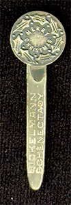 This bookmark was made in the US by an unknown manufacturer. The top is a a holly plant and says Merry Christmas. The blade says Bickelmann Schenectady.