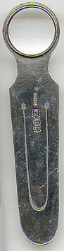 This bookmark was manufactured in London in 1898 (according to the date hallmark on the blade). The manufacturer's mark is S.M. & Co. for Sampson Mordan & Co. The top of the bookmark is a magnifying glass.