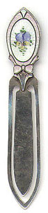 This bookmark is American made and is only marked H-RCO Sterling. It has an enamel picture of a pansie at the top. Date is probably early 1930's.