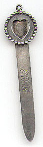 This bookmark is American made by Codding Bros. & Heilborn. It is marked CB & H. Sterling. The date is 1897 - 1918.