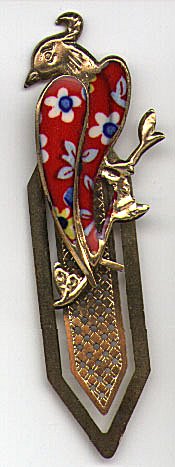 This bookmark is probably made in Japan. It is made of brass and enamel and is unmarked. It is a picture of a bird with enamel wings resting on a branch. The date is probably very recent.