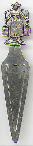 This bookmark was made in Holland. It depicts a Dutch woman carrying two buckets of water. The mark on it is a sword tilted slightly to the left. This indicates the fineness of the silver to be between .934 and .833. The mark was used until 1953.