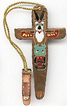 This bookmark was American made. It is made of copper and has an enamel painted Indian totem pole. It was probably a souvenir of the Pomona, California Fair sometime in the 1940's.