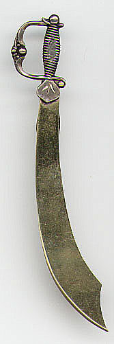 This bookmark is made in the US between 1900 and 1910. It is only marked sterling on the sword handle. The top blade is the sword blade and is finished in a gold wash. The bottom blade is much smaller and hidden behind the top. The manufacturer is unknown.