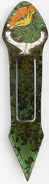 This bookmark is made in the US by the Heintz Art Metal Shop in the Arts and Crafts era, circa 1910 - 1930. It has a orange and yellow enamel flower painted over sterling on top. The blades are finished in a green florentine patina over bronze.