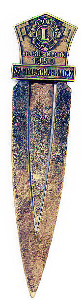 This bookmark is made in the US by an unknown manufacturer. It is marked Lions International, Brasil - N. York 1959, 42nd Int. Convention. It is made of brass.