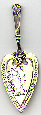 This bookmark is made in the US. It is marked on the back with what looks like a sideways deer head and Sterling. This could possibly be an old R. Wallace & Sons piece. It is in the shape of a wide trowel. The blades are done in a gold wash. The smaller blade has the words Cushings Island. This is in Portland, Maine. The date is 1900 - 1910.