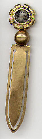 This bookmark is made in Scotland. It is made of brass with a moss agate on the top. 