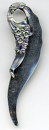 This bookmark was made in the US by the Whiting Manufacturing Company. It is marked with the manufacturers hallmark, the number 2491 and the word sterling and was sold from their 1896 catalog. The smaller blade has flowers and leaves. 