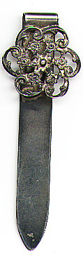 This bookmark is made in the US. It is marked only sterling on the back of the blade so the manufacturer cannot be determined. The top front is an art nouveau design.