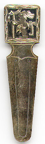 This bookmark was made in Guatemala. It is marked GUAT 900 indicating 900 Silver. The top is a picture of a Mayan man.