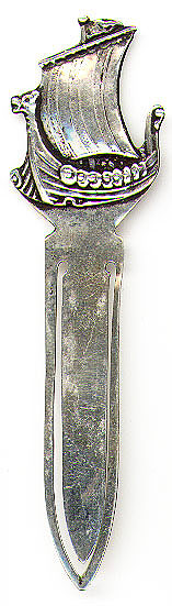 This bookmark was made in Norway probably in the 1920s. It is marked 830s and something else. The top is a Viking ship.