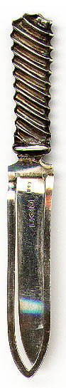 This bookmark was made in Chester, England in 1887. It is marked with L&S and the hallmarks for that place and date.
