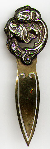 This bookmark was made in the US by an unknown manufacturer. It is marked Sterling front indicating that only the top front part is silver. It is an art nouveau piece made circa 1900.