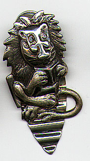 This bookmark was made in Mexico. It is marked Mexico, the makers mark JAAKE, 925 Sterling and the standard Mexican mark with the number 20 for this manufacturer. This bookmark is more of a clip but could serve the same purpose. The top blade is a Lion reading a book. Date is unknown.