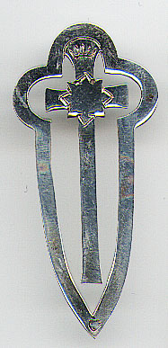 This bookmark was made in Mexico. It is marked with the mark of the Union Nacional de Industriales de la Plata. The number 23 inside it is the makers mark. The back is marked Mexico Sterling. The inside blade is a cross with a crown and and eight pointed star. The date is unknown.