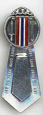 This bookmark was made in either Denmark or another Scandinavian country. It is marked 925 and the letter H within a circle. The top is a sword and a sledge hammer with red, white and blue enamel stripes representing the Norwegian flag. The edges of the larger blade have the following saying. "Jeg vil verge mitt land" and "Jeg vil bygge mit land". Date is unknown.