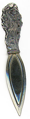 This bookmark was made in the US by Webster Company. It is marked Sterling-A on the back of the top. The top part has art nouveau flowers. Date is 1913 and was sold as a letter opener and as part of a novelty set. 