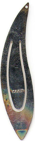This bookmark was made for All Nippon Airways by an unknown manufacturer. It is marked with the ANA logo and on the back the mark is a club (the kind on playing cards) and the word silver. Date is probably 1970 - 1980.