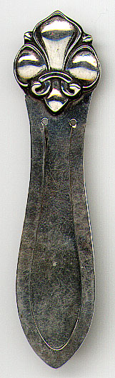 This bookmark was made in the Norway. It has hand hammered blades and a fleur-de-lis on the top. It is marked P&B 830S on the back. Date is probably 1920 - 1930.