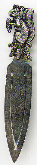 This bookmark was made in Finland. It has a squirel holding an acorn on the top. It is marked HW 813H F6 U where 813H means .830 silver, F6 is the date for 1935 and U is the city Uusikirkko.