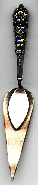 This bookmark was made in the US. It is a Masonic trowel bookmark only marked Sterling. The date is 1900 - 1910.