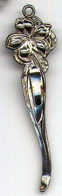This bookmark was made in the US by an unknown manufacturer. It is small and thin and has a flower on top. It is marked only sterling. The date is 1910 - 1920.