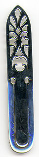 This bookmark was made in the US by Gorham Corporation. It is marked with the Gorham hallmark, sterling and the number B2520. The top is a cutout design. The date is 1910 - 1930.