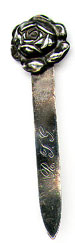 This bookmark was made in the US by Unger Brothers between 1904 and 1914. It is marked with the interlaced U and B hallmark and Sterling 925 Fine. The top is a rose which is the January flower from a set of 12. 